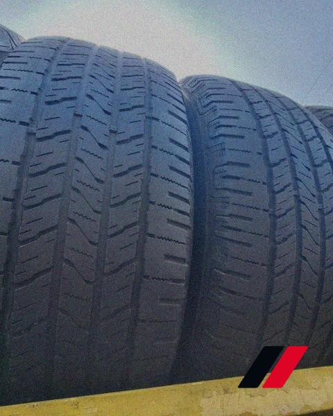 Warehouse aisle of tire stacks