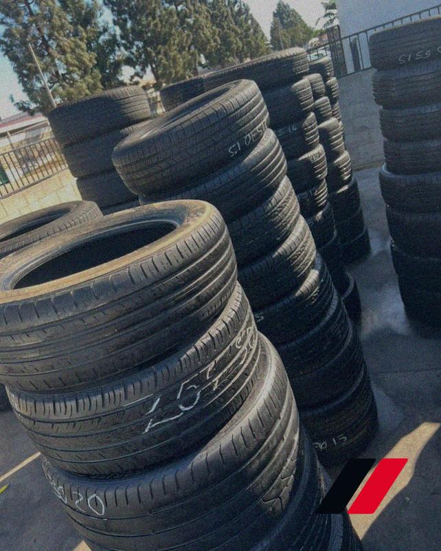 Aisle of stacked tires at Atlanta Tire Group yard in Union City